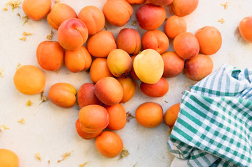 Apricots on table in the backyard