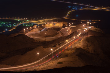 Nighttime long exposure of Viewpoint of twisted highway on Jebal Hafeet (aka Jebel Hafit) in Al...