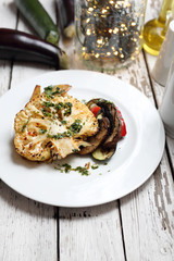 Cauliflower with mushrooms baked potatoes. Vegetarian cooking