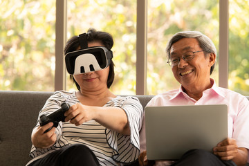 Senior couples relax on holiday with modern technologe