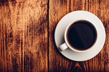 White cup of black coffee