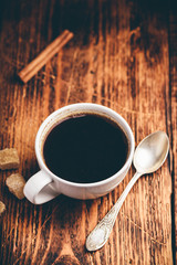 White cup of black coffee