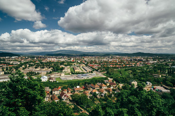 Beautiful panoramic view of Mukachevo, Ukraine from the top of The Palanok Castle or Mukachevo Castle at bright sunny day