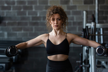 Handsome girl workout in gym