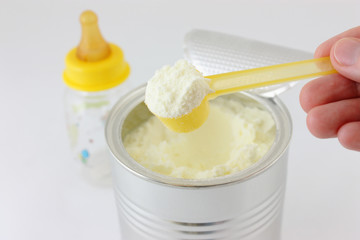 Baby Milk Formula with plastic measuring spoon
