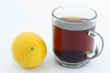 cup of tea with lemon on white background