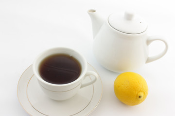 cup of tea with teapot and cup of tea