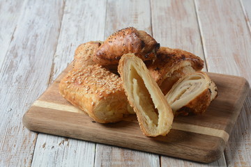 Vegetarian samosas pastries filled with potato, mushrooms, tuna. Middle Eastern food- samsa Bourekas delicious Middle Eastern hand pies. Baked, stuffed pastries filled with potato, mushrooms, tuna.