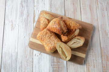 Vegetarian samosas pastries filled with potato, mushrooms, tuna. Middle Eastern food- samsa Bourekas delicious Middle Eastern hand pies. Baked, stuffed pastries filled with potato, mushrooms, tuna.