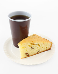 cup of coffee and cake on a plate