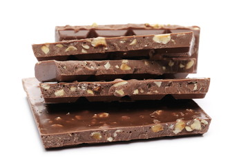 Chocolate bars with hazelnuts isolated on white background
