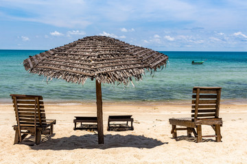 Umbrella and sundeck on a beach Thailand