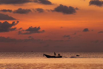 Fishing boat at sunset Thailand