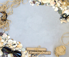summer travel, sea shells, gray background