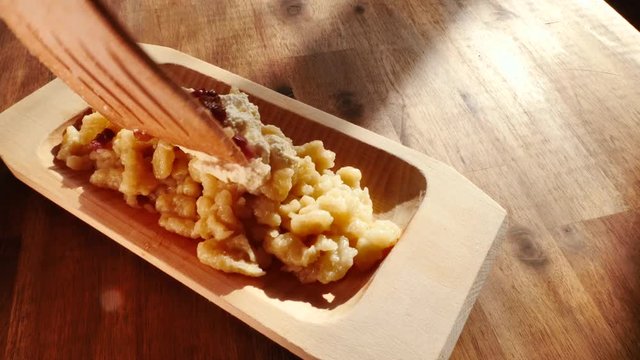 Potato dumplings with sheep cheese and bacon.