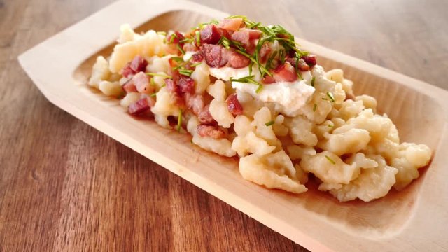 Sheep cheese dumplings with bacon.