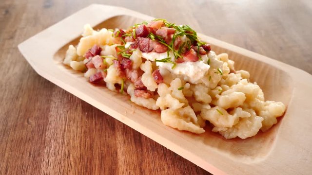 Potato dumplings with sheep cheese and bacon.