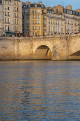 Fototapeta premium Paris, France - 04 17 2019: View along the banks of the Seine while walking