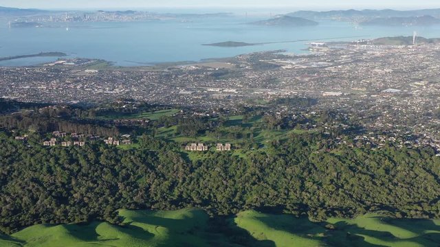 An aerial view of the congested East Bay cities of Berkeley, Oakland, El Cerrito and San Francisco Bay shows how densely populated this urban area is. 