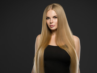 Naklejka premium Beautiful blonde hair woman beauty makeup long healthy harstyle model