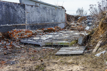 remains of destroyed agricultural buildings
