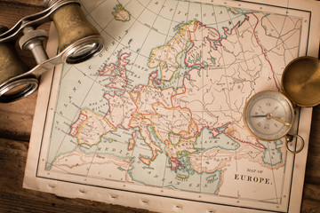 Binoculars and Compass on 1870 Map of Europe – World Travel