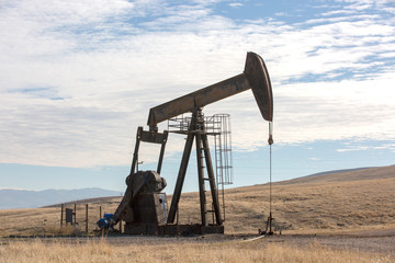 View of Pumpjack (Horsehead) at Daylight Oil Industry