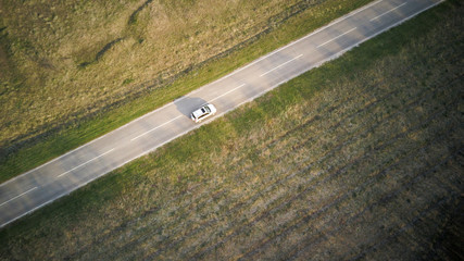 road for cars aerial view from top around green nature