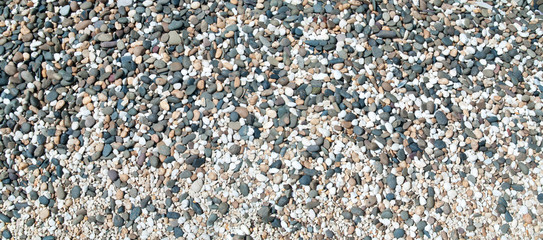 Texture of pebbles in panorama view  for background images