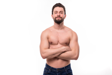 Fototapeta premium Portrait of a well built shirtless muscular man against on white background