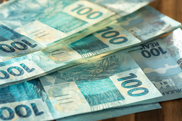 Obraz na płótnie Canvas Brazilian money, Hundred reais banknotes