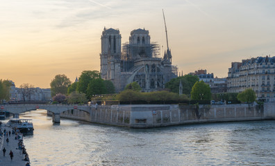 Paris, France - 04 17 2019: The day after the fire at Notre-Dame Cathedral. View from the banks of...