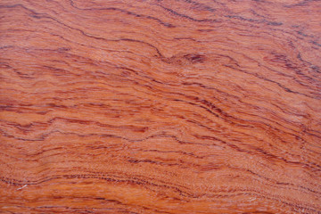 Surface texture of natural cherry veneer for design and decoration.