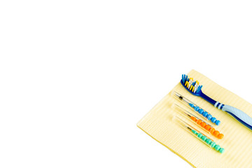 Dental care. Set of interdental brushes with toothbrush isolated on white background. - Image