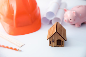 wooden house with piggy bank