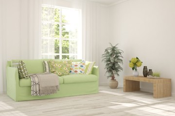 Stylish room in white color with sofa and summer landscape in window. Scandinavian interior design. 3D illustration