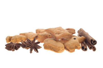 homemade biscuits,  star anise and sticks cinnamon, isolated on white background