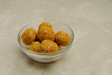 Energy balls - healthy snack rich with fibers and protein. No-bake recipe with walnuts, dried...