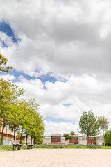 Street with Banks Park and houses and blue sky