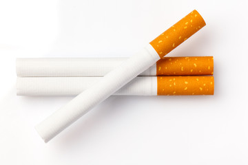 Tobacco smoking. Cigarette close up, on white background.  Bad habit. Nicotine. Drug addiction. Cancer.