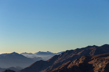 Naklejka na ściany i meble Egypt. Mount Sinai in the morning at sunrise. (Mount Horeb, Gabal Musa, Moses Mount). Pilgrimage place and famous touristic destination.