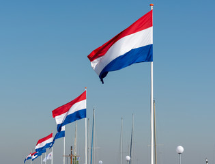 Flags of The Kingdom of the Netherlands, Dutch national flag in three colors red, white and blue and blue sky