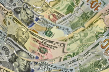 Dollars drenched in water. Laid gutter overlap on the whole frame.