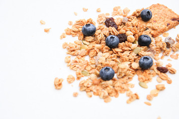 Crunchy muesli and blueberry Breakfast cereals isolated on white background, selective focus, top view