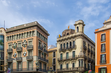 Fototapeta na wymiar Facades of houses on the Rambla in Barcelona