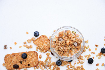 Crunchy muesli cookies and blueberries, Breakfast cereals isolated on white background, selective focus, top view