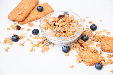 Crunchy muesli cookies and blueberries, Breakfast cereals isolated on white background, selective focus, top view