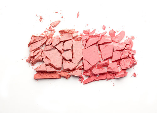 Broken rouge, pouder, eye shadow isolated on white. Trendy coral color. Duotone