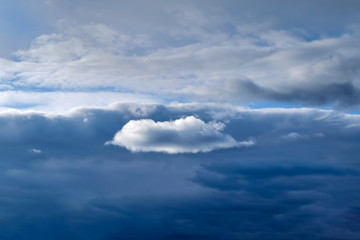 Naklejka na ściany i meble Sky with rain clouds before the storm.