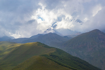 View of Caucasus mountains near Kazbek peak, Stepantminda, Georgia